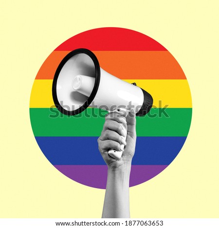Art design. Female hand with megaphone isolated on LGBT flag background.