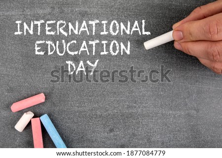 International Education Day, 24 January. Gray chalk board. Royalty-Free Stock Photo #1877084779