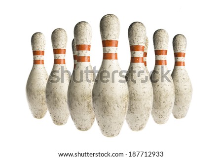 Used vintage bowling pins isolated on white