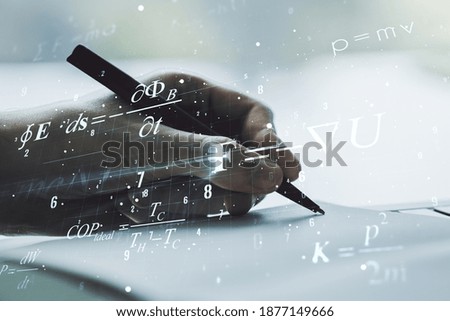 Double exposure of creative scientific formula concept with man hand writing in notebook on background, research and development concept