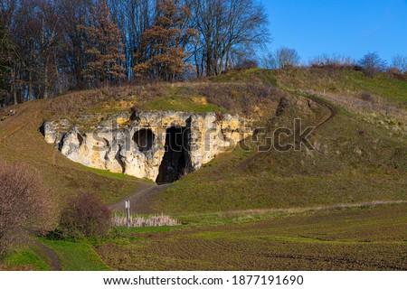 The Duivelsgrot (English: devils cave) in the Jekervallei (English Jekervalley) close to Maastricht on a sunny autumn day in December.  This cave is a landmark in the scenery and well known. 