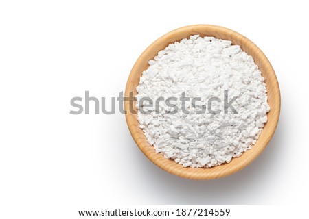Sweet potato starch in a wooden bowl isolated on white background. Top view.
 Royalty-Free Stock Photo #1877214559