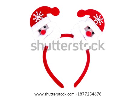 Christmas headband Santa Claus head design isolated on white background. Pair of Santa claus headband decoration isolated