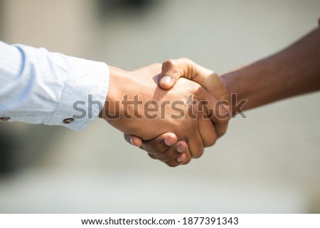 handshake of two african men