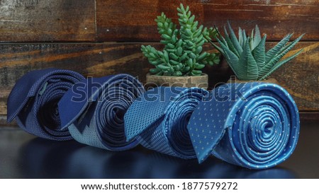 Perfect necktie close up. Shopping concept. Personal stylist service. Stylist advice. Matching necktie with outfit. Pick necktie. Different color necktie. Menswear clothes and accessories. Royalty-Free Stock Photo #1877579272