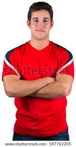Handsome football fan in red jersey on white background
