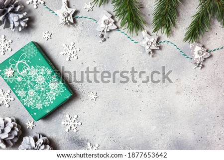 Christmas holidays composition on gray stone background with copy space for your text.