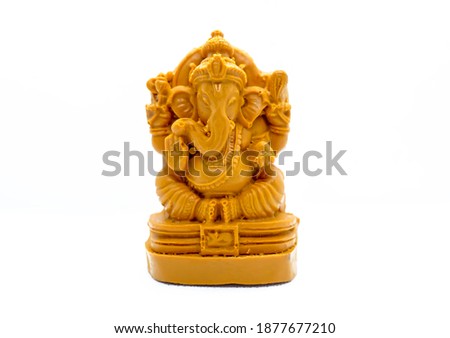 Lord Ganesh idol on white background
