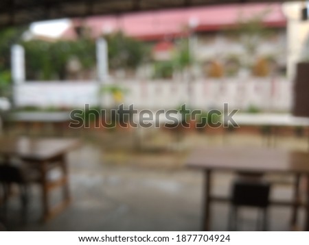 blur outside cafe in rainy day