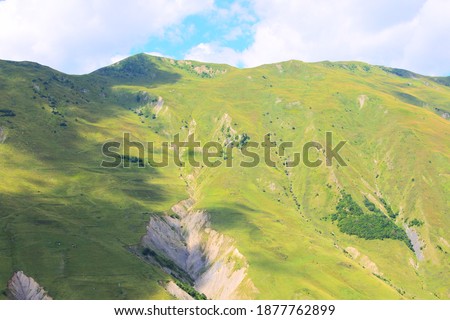 Lush alpine meadows, passes and open spaces of the mountains of Georgia