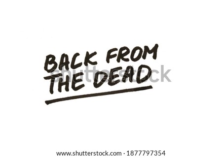Back from the dead! Handwritten message on a white background.