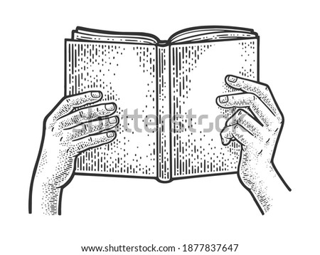 Book in hands sketch engraving vector illustration. T-shirt apparel print design. Scratch board imitation. Black and white hand drawn image.
