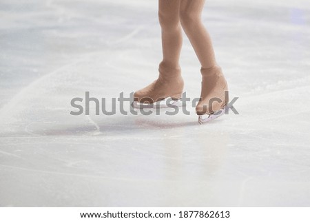 Ice Skating shoes white color on freeze ice  skate field                                      