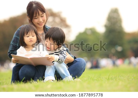 Parents and children reading books