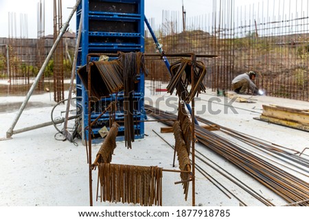 Metal structures from reinforcement for pouring concrete in monolithic construction. Construction site. Improving the reliability of the construction of concrete houses