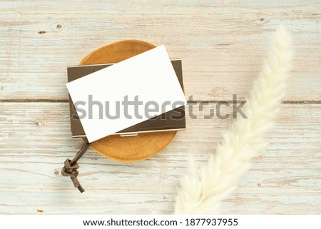 Wooden background and business card mock-up