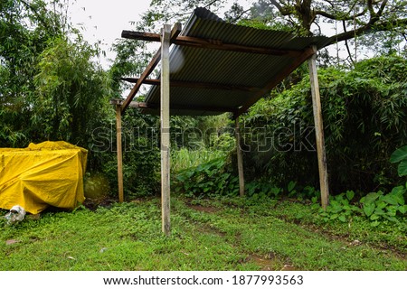 Picture of shelter beside in agricultural field in Indian village.