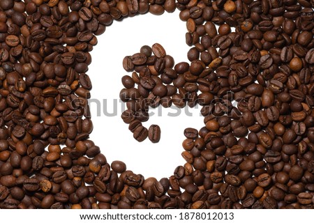 Symbol G, the letter of an aphovite made of coffee. Coffee background, letter G