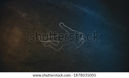 Top Down Shot of a Chalk Body Outline on the Pavement Symbolizing a Crime Scene Done on a Street at Night. Forensic science investigate Horrbile Murder with Death. Royalty-Free Stock Photo #1878035005