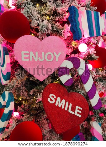 message in red heart on tree christmas background.