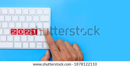 Finger hand man point ENTER on keyborad for new year 2021. Happy new year start up concept. With copy space.