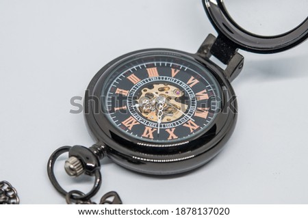 Antique clocks or self-winding watches