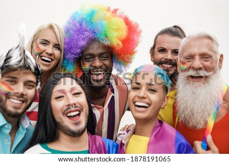 Cheerful multiracial people from different generations at gay pride parade - Concept of lgbt and homosexual love Royalty-Free Stock Photo #1878191065