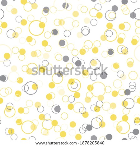 Yellow and gray dots. Seamless pattern. Polka dot design for print on fabric. Vector illustration.