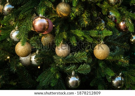 Christmas tree decorated with Golden balls. Christmas background
