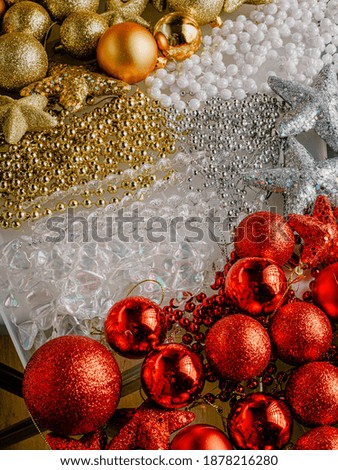 Festive Decoration. Christmas decoration. Snow globes and golden stars Christmas composition.