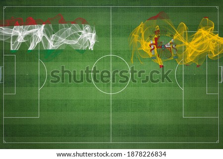 Hungary vs Spain Soccer Match, national colors, national flags, soccer field, football game, Competition concept, Copy space