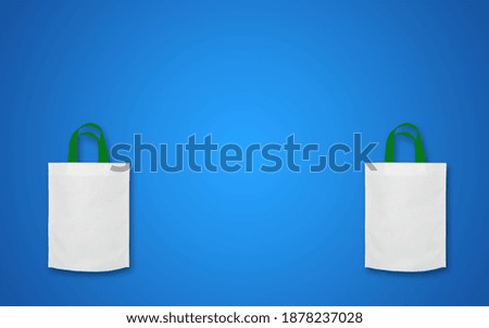 Loop Handle White Mock-up Bags with Blue Background.  Amazing Original Bags for advertisements. ECO Friendly Shopping Bags with Copy Space for text and logo.