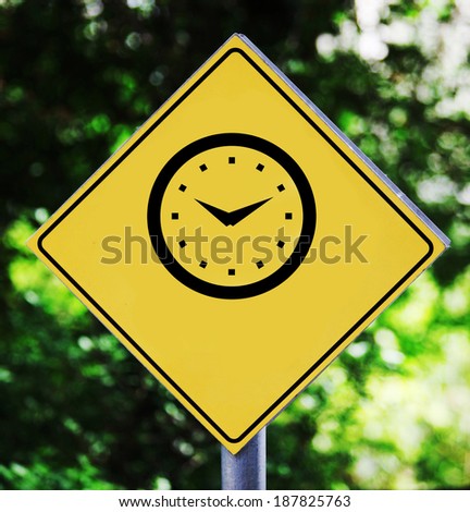 Yellow traffic label with clock pictogram