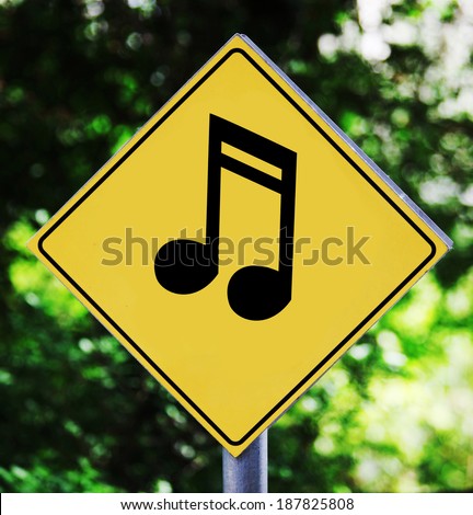 Yellow traffic label with musical note pictogram