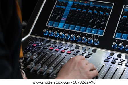 Technician at Digital Audio Desk Royalty-Free Stock Photo #1878262498