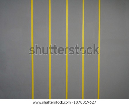 Seamless vertical striped gray and yellow background
