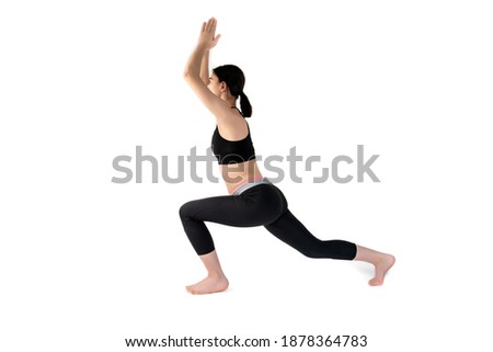 Young woman doing yoga practice isolated on white background. Flexible fit female body.