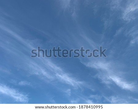 The Cirrus clouds are streaked in the sky like a thin feather and weather is clear in the morning at Bangkok, Thailand. No focus