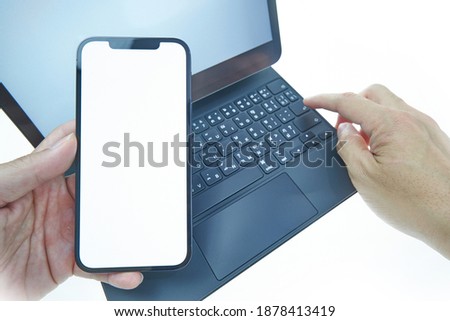 Holding a New Smart Phone on White Background