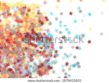 Snowflake Confetti Glitter isolated on white background. Sprinkles Polyester Glitter flakes.