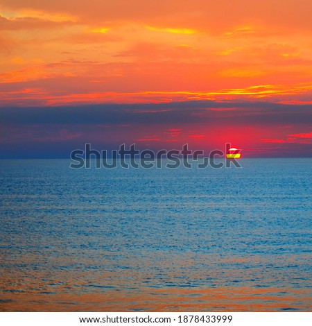 Beautiful sunrise over the sea, . The concept is travel.