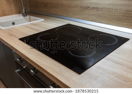 Electric Hob in The kitchen Royalty-Free Stock Photo #1878530215