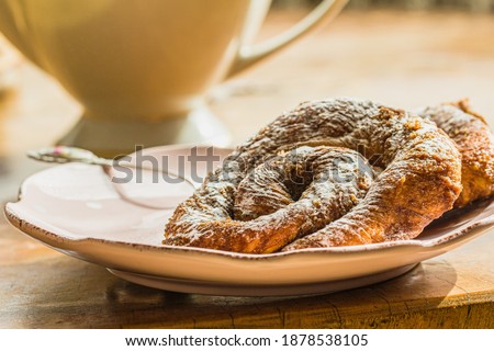 Zeeuwse bolus made by baking a white bread dough rolled in dark brown sugar in a spiral shape, created in Zeeland. Royalty-Free Stock Photo #1878538105