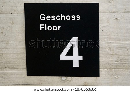 Floor number at the staircase of airport car park. Geschoss (german) means floor.