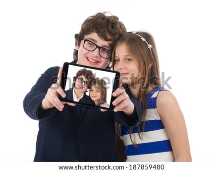 Young Couples taking a selfie with a mobile pad 