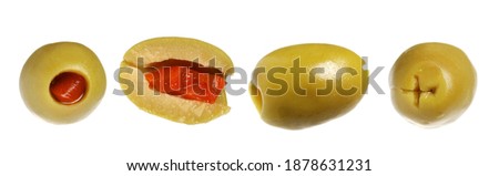 Set green olives with chopped red paprika isolated on white background, clipping path Royalty-Free Stock Photo #1878631231