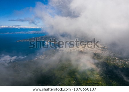 Pelion Mountain and Volos city on background. Aerial view of the mountains at morning. Magnesia - Greece.