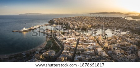 Aerial drone panoramic photo of famous port of Pireus or Piraeus where passenger ferries and cruises travel to popular Aegean island destinations as seen from high altitude, Attica, Greece Royalty-Free Stock Photo #1878651817