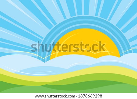 A huge sun rising on the background of a field with a farm harvest