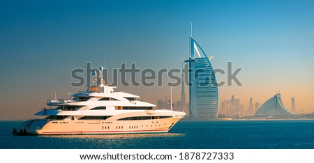 Dubai city center skyline and famous Jumeirah beach in the morning, United Arab Emirates
